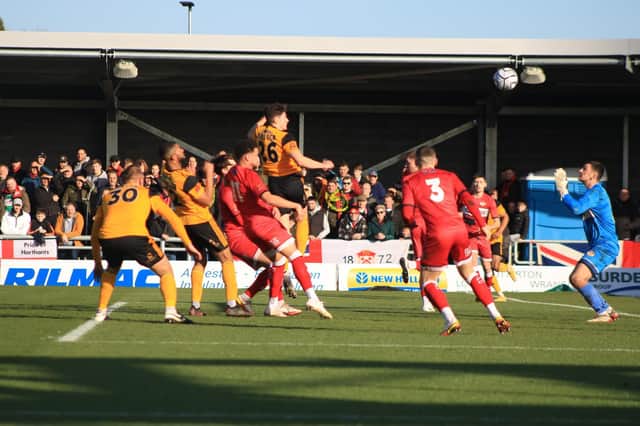 Loanee Pollock heads United in front. Photo: Oliver Atkin