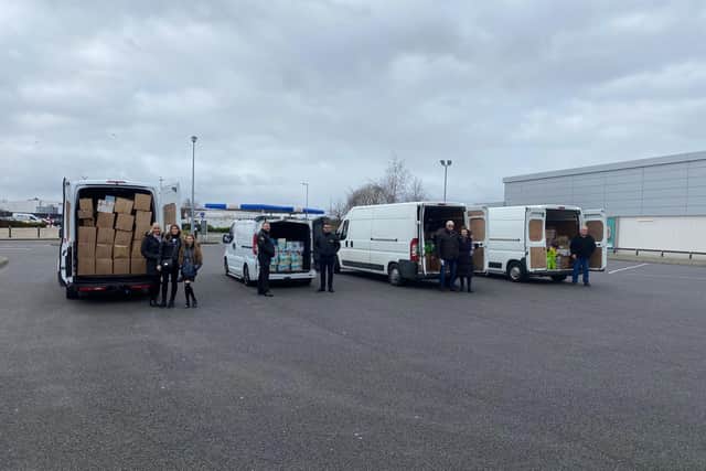 Volunteers with some of the vans leaving Skegness today.
