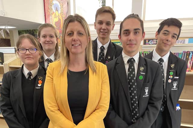 Katie Belcher, head of school for Giles Academy, and Year 11 head students who will be part of the judging panel.