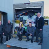 Some of the Duckworths team with the second load of goods being transported on Monday EMN-220703-195303001