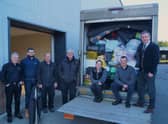 Some of the Duckworths team with the second load of goods being transported on Monday EMN-220703-195303001