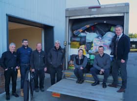 Some of the Duckworths team with the second load of goods being transported on Monday EMN-220703-195303001