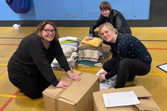 Staff and volunteers busy packing in the Skegness Academy Sports Hall.