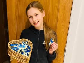Belle Nicholls, 10, has been making blue and yellow ribbons for the Ukraine Appeal in support of UNICEF and the Red Cross.