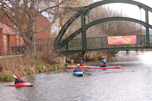 Mesing about in boats on the River Slea on Sunday. EMN-220314-162858001