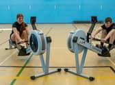 Scarlett Stone and Scott Adlington are celebrating after winning gold in a national indoor rowing competition.