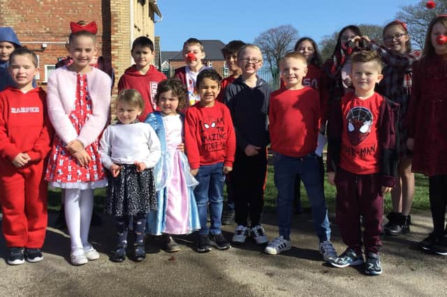 Pupils at Hogsthorpe Primary School celebrating Red Nose Day.