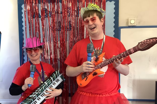 Staff members Anna Bradbrook and Connor Ratcliffe having a fun time. 
They arranged an after school party at the club at the Richmond School in Skegness with entertainment.