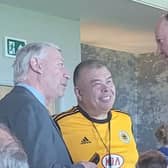 Boston United chairman David Newton, left, with Sir Jonathan and Sir Christopher.