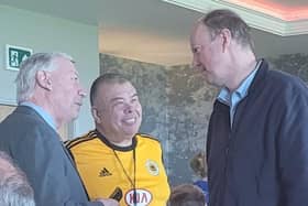 Boston United chairman David Newton, left, with Sir Jonathan and Sir Christopher.