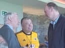 Boston United chairman David Newton, left, with Sir Jonathan and Sir Christopher.