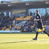 Craig Forbes was plucked from the crowd to run the line as Boston United hosted Gateshead. Photo: Oliver Atkin