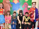 These pupils at Staniland Academy in Boston, dressed as comic book superheroes, swung into action to support Comic Relief on Friday.