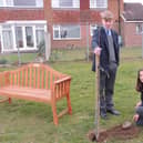 Kieran lloyd, Year 10, and Harriet Giles-Bone, Year 9, planting one of the final trees for the Arc of Remembrance at St George's Academy, Sleaford. EMN-220321-143104001