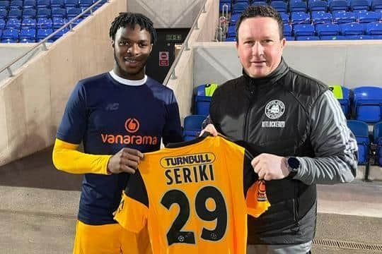 Femi Seriki with Boston manager Paul Cox. Photo: Boston United