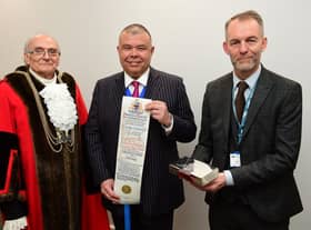 Professor Sir Jonathan Van-Tam with his Freedom of the Borough Award (centre), pictured with Boston Mayor Coun Frank Pickett and Boston Borough Council joint chief executive, Robert Barlow.