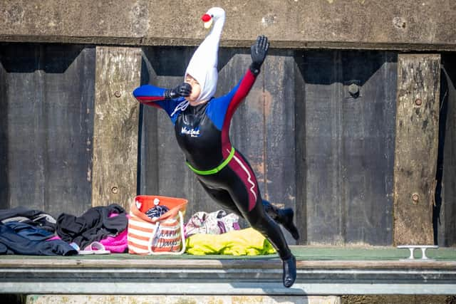 A participant in the belly flop competition gives it her all. Photos by Mark Deith.