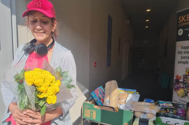 Flowers for Mother's Day were a lovely surprise for grandma Shirzell Depravia when she visited Skegness Food Bank at the Storehouse.