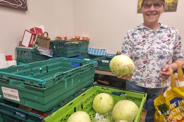 Volunteer Sarah Fletcher preparing a food parcel at the Storehouse Food Bank in Skegness.