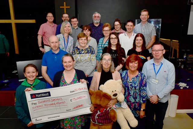 Representatives of the different organisations that received money with the Mutual Gain organisers. EMN-220328-102855001