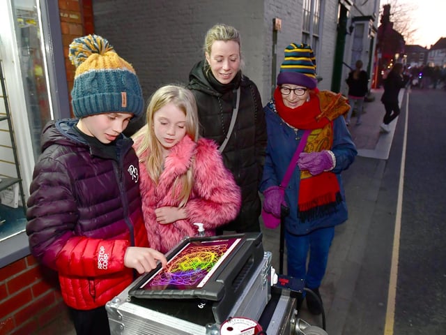 Busy designing at an interactive display is Jenson Elsam, 10, with Perdy Elsam, 8, Dana Elsam (mum) and Rita Short (grandma) of Eastville.