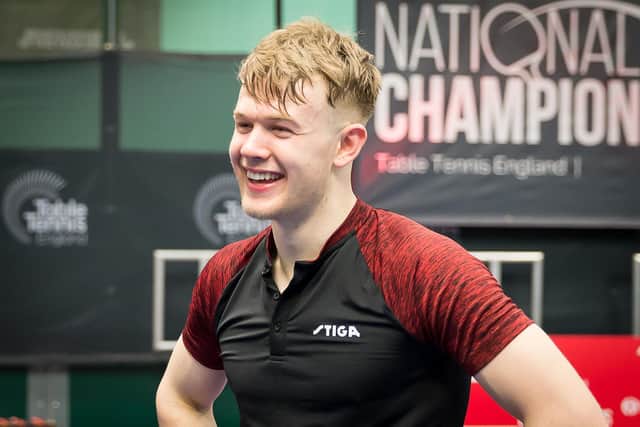 Tom Jarvis is all smiles after winning his first senior national singles title. Photo: Alan Man
