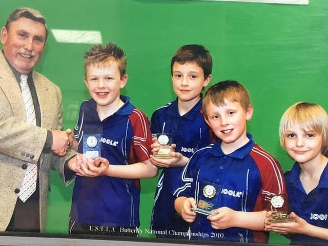 Tom Jarvis (second left) receiving one of his first awards as a pupil at the Richmond School in Skegness.