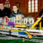 Glyn Halgarth and Elliott Halgarth 10 of Sibsey, with their lego model. EMN-220330-093737001