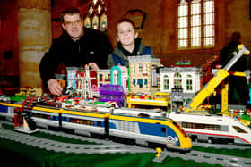 Glyn Halgarth and Elliott Halgarth 10 of Sibsey, with their lego model. EMN-220330-093737001