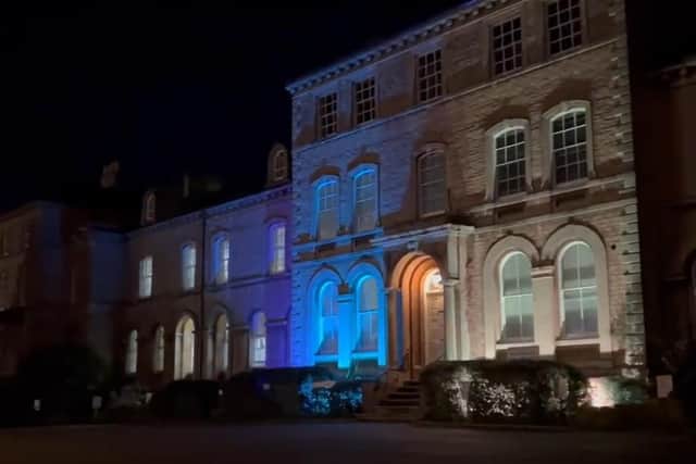 North Kesteven's district council offices lit up in the colours of the Ukrainian flag in solidarity against the invasion by Russia.