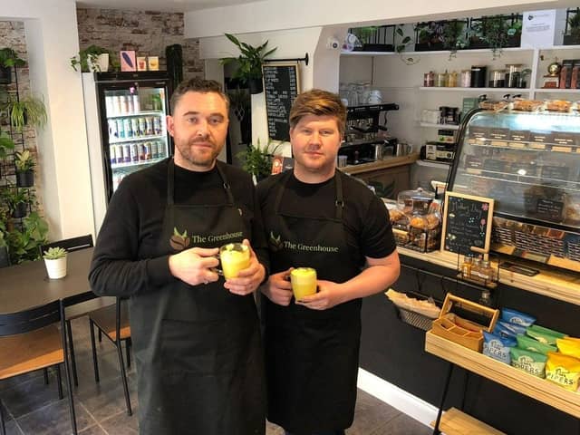 Daniel Revell-Wiseman (left) and husband Lee, of The Greenhouse Coffee Shop, Boston.