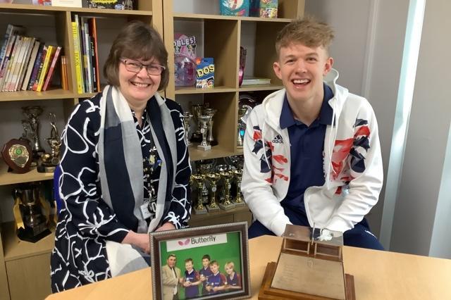 Head Teacher Caroline Wellsted congratulating her former pupil Tom Jarvis. They are pictured chatting about memories of when he attended the Richmond School 11 years ago.