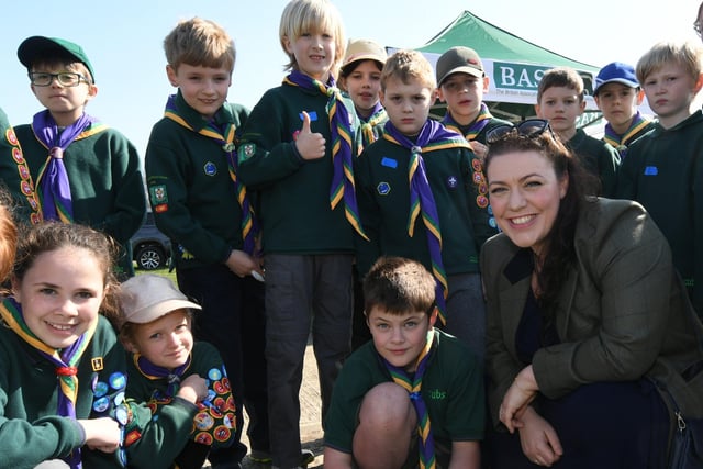 Kids Country Cubs and Scouts event at the East of England Arena. Rutland MP Alicia Kearns with The Deepings Apaches learning how to make a camp fire. EMN-220328-140212009