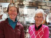 Pictured is past Captain Ruth Simpson presenting the Cheer Cup to Val Simpson (right).