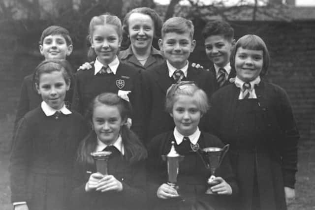 Miss Gledhill with some of her pupils