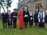 Pictured  after the ceremony are, from left:  Under Sheriff Michael Pace; His Honour Judge Simon Hirst; LordLieutenant Toby Dennis ; Kerry Strawson; High Sheriff Tim Strawson; Barbara Fontaine, The Queens Remembrancer; outgoing High Sheriff Claire Birch; the Rev Chris Hewitt and churchwarden Debbie Rudd,EMN-220404-144728001