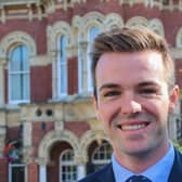 Leader of SKDC Coun Kelham Cooke, in front of the St Peter's Hill offices.