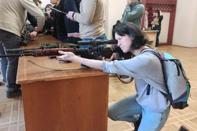 Singer Ira Lobanok, 21, decided not to leave the Ukraine and took up arms to fight for her country.