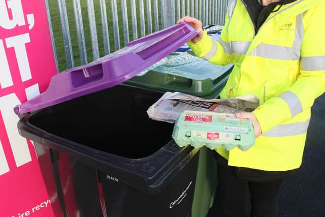 Purple lidded bins are for dry and clean paper and cardboard - not shredded, dirty or greasy