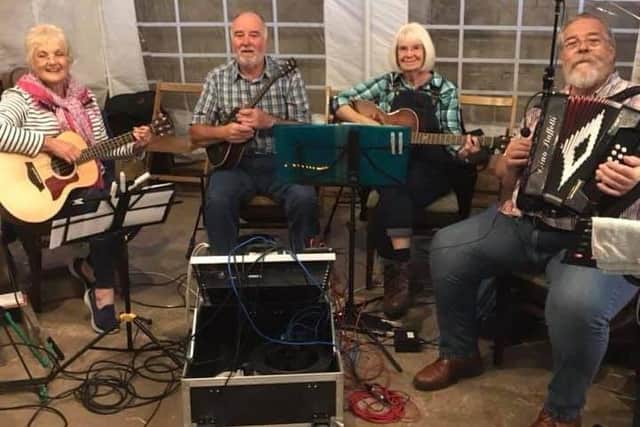 Malt Whiskers playing at Heckington Mill. EMN-221204-160723001
