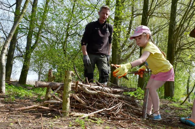 Hill Holt wood ranger, John Feneley with Jessica Swindell 7 of Billingborough EMN-220418-092953001