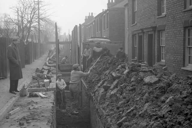 All's well that ends smells - the work taking place in Irby Street, in 1962, which residents hoped would help with flooding and bad smells.