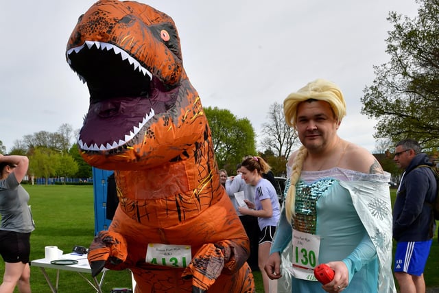 Boston community runners L-R Gary Beck-Sykes and Dan Simpson took part in the fun run dressed as a dinosaur and Elsa from Disney's Frozen. EMN-220418-133600001