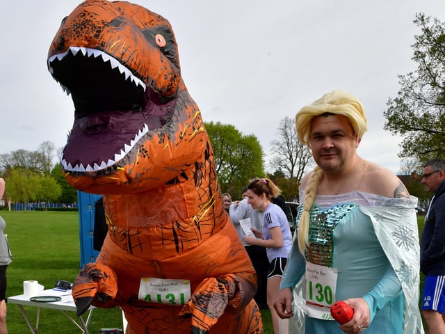 Boston community runners L-R Gary Beck-Sykes and Dan Simpson took part in the fun run dressed as a dinosaur and Elsa from Disney's Frozen. EMN-220418-133600001