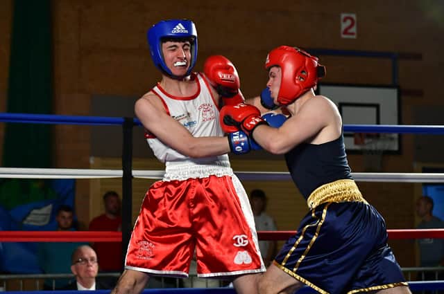 Tom McGoran (Sleaford ABC red), Kye Hade (Newark BA blue) EMN-220418-092545001