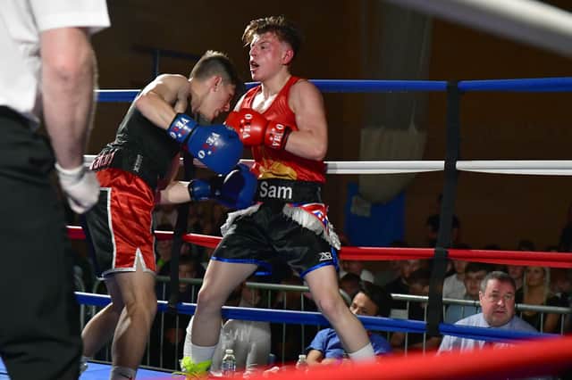 Sam Smith (Epic GG red), Jack Dillingham (Claycross Pro-Fitness ABC blue) EMN-220418-092447001