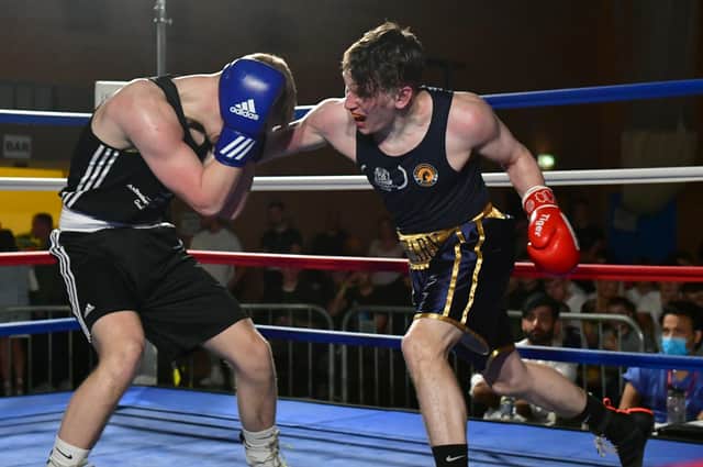 Ed Nearn (Sleaford ABC red), Kieron Robinson (Riddings ABC blue) EMN-220418-093103001