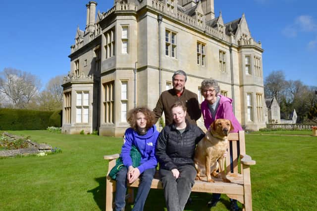 One of the first Ukrainian families to arrive to stay in Lincolnshire. Front - Maria Avvakumova and her 17-year-old son Borys Avvakumov, pictured with Jonny and Emma Hoare and dog Crab, at Rauceby Hall near Sleaford. EMN-220404-125514001