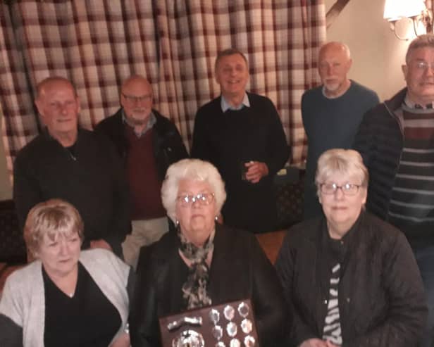 Pictured are the SPC Cosmos team of Rod Stephens, Tony Royce, captain Rob Singleton, Denis Patman, Geoff Dunmore, Ann Ford, Yvonne Walsham and Carole Bolton.