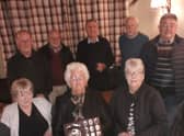 Pictured are the SPC Cosmos team of Rod Stephens, Tony Royce, captain Rob Singleton, Denis Patman, Geoff Dunmore, Ann Ford, Yvonne Walsham and Carole Bolton.